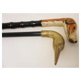 1016	LOT OF 2 CANES/WALKING STICKS, COMPOSITE DOG HEAD & BRASS DUCK HEAD, TALLEST APPROXIMATELY 39 I