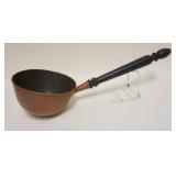 1028	LARGE HAND MADE COPPER LADLE, APPROXIMATELY 23 IN LONG