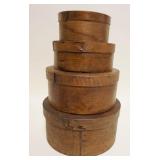 1034	NEST OF 4 ROUND BOXES, 9 IN X 4 1/2 IN