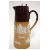 1092	DOULTON ENGLAND PITCHER WITH METAL LID, APPROXIMATELY 8 1/2 IN H, WIT EMBOSED TAVERN SCENES