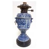 1103	ANTIQUE GERMAN STONEWARE KEROSENE LAMP, APPROXIMATELY 15 IN H, LOSS TO SIDE RING