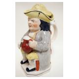 1119	ANTIQUE STAFFORDSHIRE TOBY PITCHER APPROXIMATELY 11  IN H, OLD REPAIR TO LID
