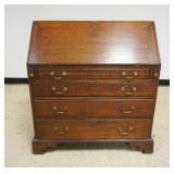 1225	ANTIQUE ENGLISH OAK SLANT FRONT SECRETARY DESK HAVING 4 LOWER DRAWERS, LOSS TO LEFT REAR LEGS, 
