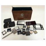 1052	LOT ANTIQUE FLASH AND FILM HOLDER