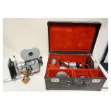 1062	 PENTAFLEX 16 MM MOVIE CAMERA WITH LENS