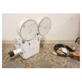 1117	*PHOTO SONICS* 70 MM MOVIE CAMERA, APPROXIMATELY 31 IN X 12 IN X 25 IN HIGH