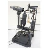 1153	SLIT LAMP, APPROXIMATELY 11 IN X 12 IN X 21 IN H