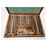 1176	TRIAL LENS SET IN BOX, APPROXIMATELY 20 IN X 14 IN X 3 IN