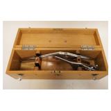 1181	ANTIQUE SURGICAL STAPLER IN OAK BOX, APPROXIMATELY 17 IN X 5 IN X 6 IN