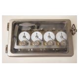 1189	TIME CLOCK FOR BANK VAULT W/KEY, APPROXIMATELY 8 IN X 5 IN X  IN