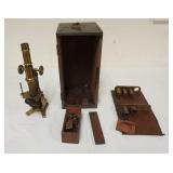 1212	ANTIQUE BRASS MICROSCOPE IN FITTED BOX, VERNEER ADJUSTMENT TO RAISE & LOWER STRIPPED, APPROXIMA