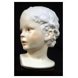 1013	CYBIS PORCELAIN HEAD MOUNTED ON WOOD, APPROXIMATELY 10 IN HIGH