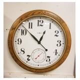 1155	LARGE 25 IN ROUND HOWARD MILLER QUARTZ WALL CLOCK IN OAK CASE
