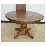 1183	SOLID OAK 48 IN ROUND PEDESTAL TABLE W/18 IN LEAF