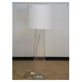 1244	TANNER KENZIE CLEAR GLASS CYLINDER FLOOR LAMP, APPROXIMATELY 63 IN HIGH