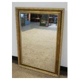 1267	HANGING BEVELED EDGE MIRROR IN GILT FRAME, APPROXIMATELY 30 IN X 42 IN