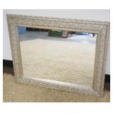 1271	HANGING MIRROR IN SILVER FINISHED EMBOSSED FRAME, APPROXIMATELY 23 1/2 IN X 29 1/2 IN