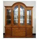 1179	THOMASVILLE SOLID OAK LEADED GLASS, DOME TOP BREAKFRONT W/MIRROR BACK, INTERIOR LIGHTS & ADJUST