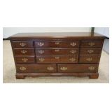 1196A	CHEST OF DRAWERS WITH CHERRY FINISH, HAVING 8 DRAWERS, APPROXIMATELY 63 IN X 18 IN X 32 IN