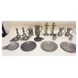 1061	LARGE LOT OF ASSORTED ANTIQUE PEWTER INCLUDING CANDLESTICKS, 9 IN PLATES, MEASURES, PORRINGERS