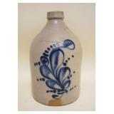 1069	BLUE DECORATED STONEWARE JUG, TOWELL MASS, APPROXIMATELY 11 3/4 IN HIGH