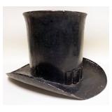 LARGE ANTIQUE HAND MADE METAL TOP HAT FOR A HABERDASHERY HANGING SIGN ON STORE FRONT, HAS BUCKLE IN FRONT, APPROXIMATELY 21 IN X 25 IN X 15 IN HIGH