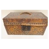 1113	SMALL PRIMITIVE LEATHER COVERED TRAVEL BOX W/BRASS TACK ACCENTS & DESIGN & PAPER LINING, APPROX