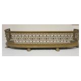 1124	ANTIQUE BRASS PAW FOOT FIREPLACE FENDER, APPROXIMATELY 47 IN X 16 IN X 9 1/2 IN HIGH