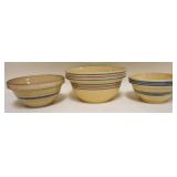 1154	LOT OF 3 YELLOWARE BOWLS W/BLUE & BLUE & SALMON COLOR BANDS, LARGE BOWL HAS RIM CHIP, LARGEST A