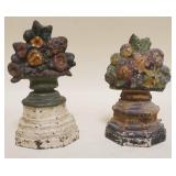 1161	2 SMALL FLORAL BASKET CAST IRON DOOR STOPS, APPROXIMATELY 7 1/4 IN HIGH