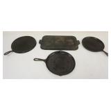 1190	4 PIECE LOT GRISWOLD GRIDDLES INCLUDING #10, #8, #109 & ONE UNMARKED