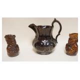 1215	BROWN GLAZED PITCHER & 2 SMALL BENNINGTON POTTERY TOBIES, TALLEST APPROXIMATELY 10 IN