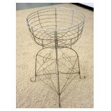 1243	WIRE METAL BASKET STAND, APPROXIMATELY 16 IN X 28 IN