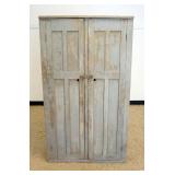 1251	COUNTRY 2 DOOR CUPBOARD 4 INTERIOR SHELVES, EACH DOOR HAS SMALL HOLE CUT OUTS, APPROXIMATELY 14