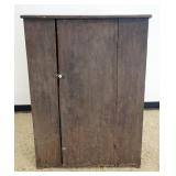 1254	PRIMITIVE COUNTRY ONE DOOR CUPBOARD IN GRAY W/MUSTARD YELLOW INTERIOR, APPROXIMATELY 16 IN X 35