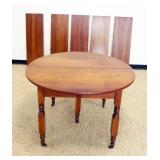 1259	COUNTRY CHERRY 46 IN ROUND TABLE W/5-15 1/4 IN PINE STAINED CHERRY TABLE LEAVES, APPROXIMATELY 