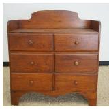 1269	PRIMITIVE PINE DOVETAILED CABINET, 6 DRAWER W/BACK SPLASH & UNUSUAL ARCHED & SCROLL BASE, APPRO