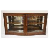 1319	OAK MIRROR BACK SERPENTINE FRONT COUNTER TOP DISPLAY CASE, APPROXIMATELY 35 IN X 13 IN X 18 IN 