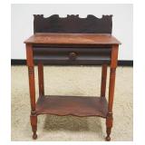 1286A	PRIMITIVE 1 DRAWER STAND WITH BACK SPLASH, APPROXIMATELY 24 IN X 16 IN X 34 IN H
