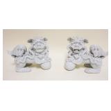 1001	PAIR OF WHITE PORCELAIN FOO DOGS, EACH APPROXIMATELY 10 IN X 5 IN X 8 IN HIGH