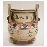1034	ASIAN POTTERY FOOTED POT DECORATED W/CHARACTER MARKS, APPROXIMATELY 5 1/2 IN X 7 1/2 IN HIGH