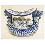 1043	ASIAN BLUE & WHITE PORCELAIN DRAGON PILLOW, CHARACTER MARKS ON BASE, APPROXIMATELY 9 IN X 4 IN X 6 IN