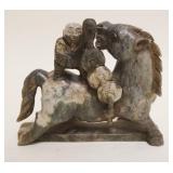 1063	ASIAN CARVED STONE FIGURE OF ASIAN MAN STANDING ON HORSE BACK, APPROXIMATELY 6 1/2 IN X 2 IN X 