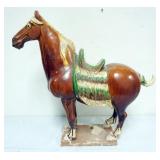 1191	CHINESE TERRACOTTA GLAZED FIGURE OF A HORSE, APPROXIMATELY 7 IN X 24 IN X 22 IN H