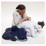 1228	CHINESE TERRACOTTA STATUE OF MAN GIVING ACCUPUNCTURE TO A WOMAN, BACK APPROXIMATELY 11 IN X 8 I