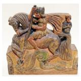 1233	CARVED ASIAN WOOD IMAGE OF A WARRIOR ON HORSE, APPROXIMATELY 3 IN X 9 IN X 9 IN