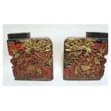 1234	PAIR OF CHINESE CARVED WOOD BLOCKS WITH DRAGON HEAD IMAGES, EACH APPROXIMATELY 12 IN X 3 IN X 1