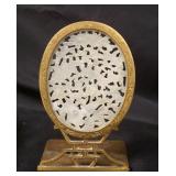 1269	OVAL JADE MEDALLION IN BRASS BOOKEND STAND, APPROXIMATELY 3 1/2 IN X 4 IN X 7 IN HIGH