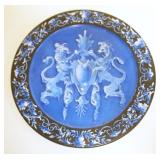 1047	PORCELAIN 8 IN ROUND PLATE W/EMBOSSED RAMPANT LIONS ON CREST