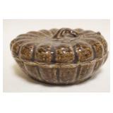 1052	GLAZED POTTERY LIDDED PUMKIN, APPROXIMATELY 7 1/4 IN X 3 IN HIGH